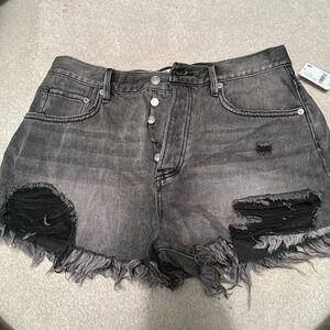 Free people black distressed denim jean shorts. NWT. Size 27